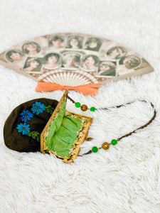 Antique 1920s beaded silk bag with rococo trim