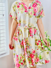 Load image into Gallery viewer, Vintage floral cotton dress with belt on model
