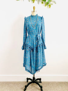 Vintage Blue Floral Dress with Ruffles and Ruched Sleeves