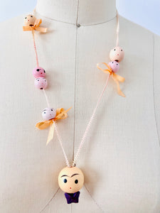 Handmade wooden novelty faces necklace