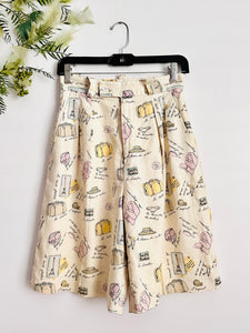 Vintage “travel essentials” novelty print linen shorts