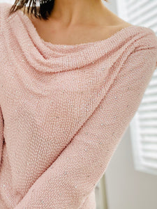 model wearing a beaded vintage pink top 