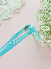 Load image into Gallery viewer, side of a 1950s blue cat eye glasses 
