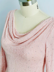 details of a beaded pink top 
