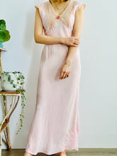 Load image into Gallery viewer, model wearing a vintage 1930s pink lingerie dress with lace and ribbon 
