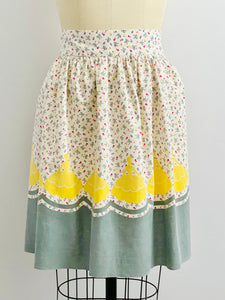 Vintage 1930s novelty print apron lady and ribbon bows