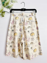 Load image into Gallery viewer, Vintage “travel essentials” novelty print linen shorts
