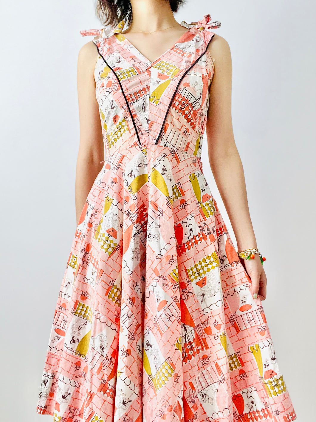 Vintage 1940s pink novelty print dress