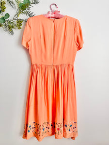 1950s style orange embroidered dress