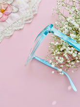 Load image into Gallery viewer, side of a 1950s blue cat eye glasses 
