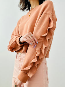 Peach color ruffled pullover top