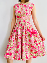 Load image into Gallery viewer, 1950s Ribbon Bow Floral Dress with Single Side Pocket Pink Buttons
