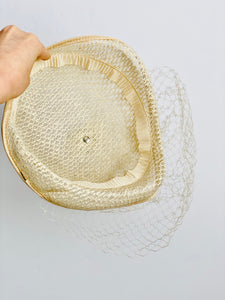 Vintage cream color fascinator with veil