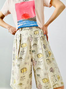 Vintage “travel essentials” novelty print linen shorts