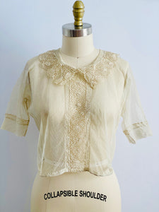 vintage 1920s chemical lace top on mannequin